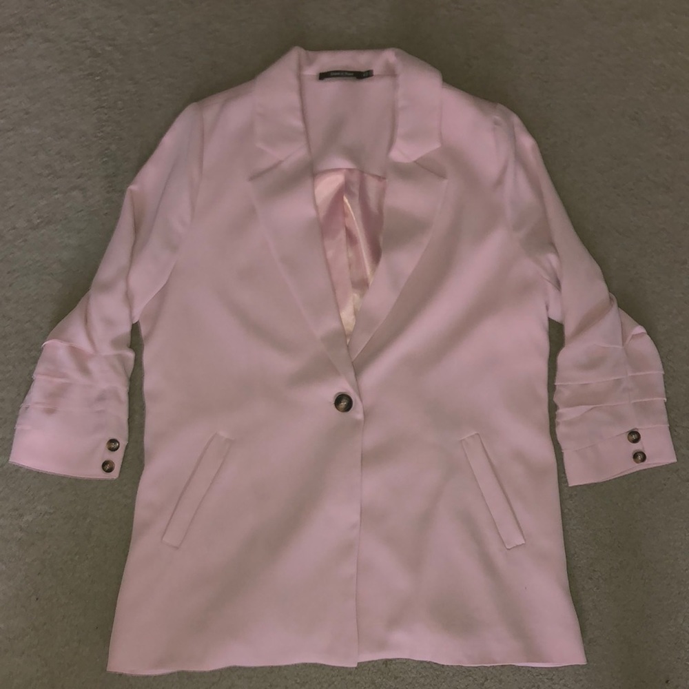 oversized pink blazer with ruffle sleeve details, some pilling on right side